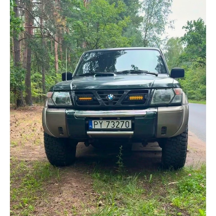 Two Kramp LED Lamps with ORAX Systems Grille Brackets — Nissan Patrol Y61