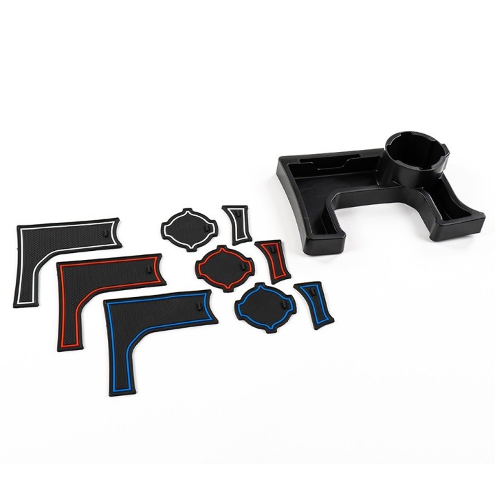 Centre console storage with cup holder, manual transmission OFD