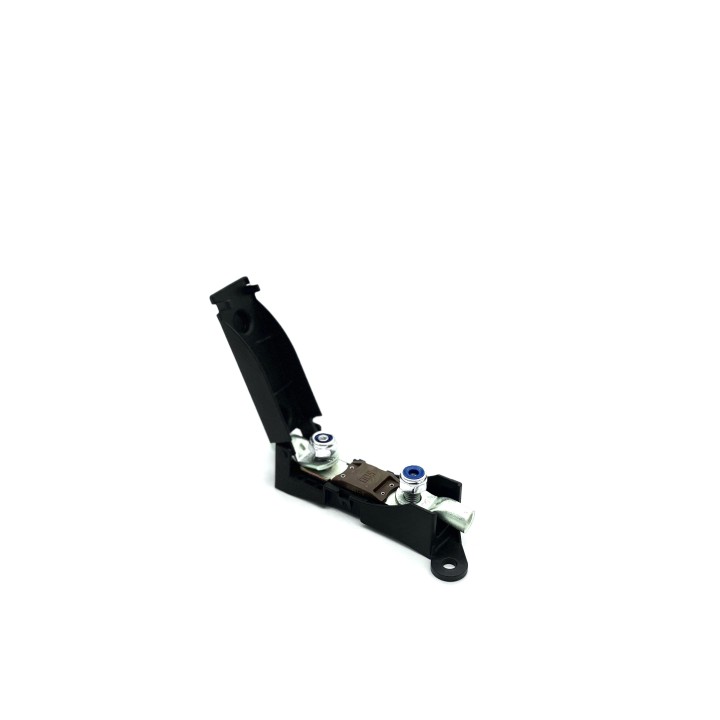 The fuse housing assembled with the fuse clamped in, seen at an angle