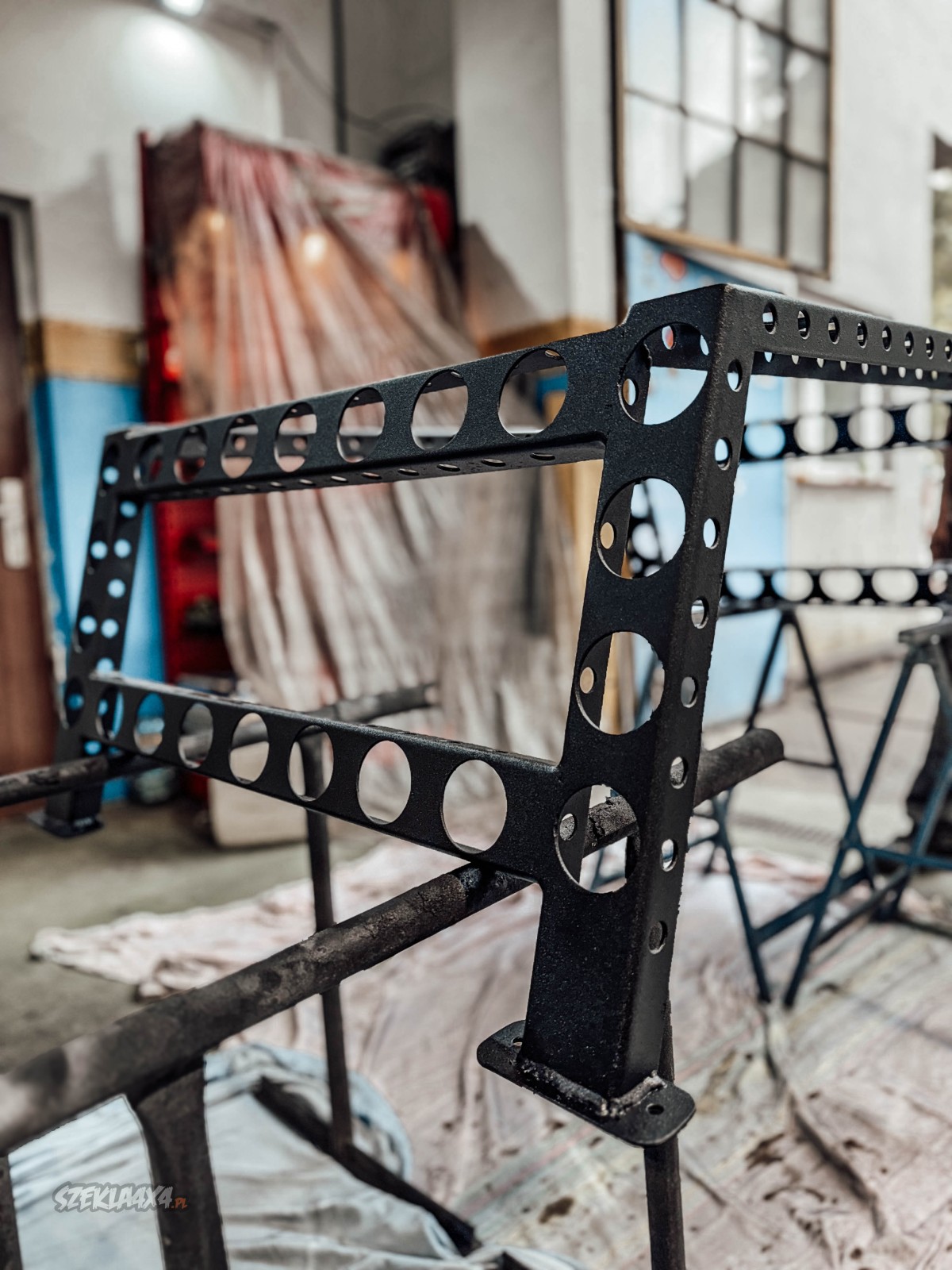 Custom expedition rack mounted on the bed of a Ford Ranger Raptor